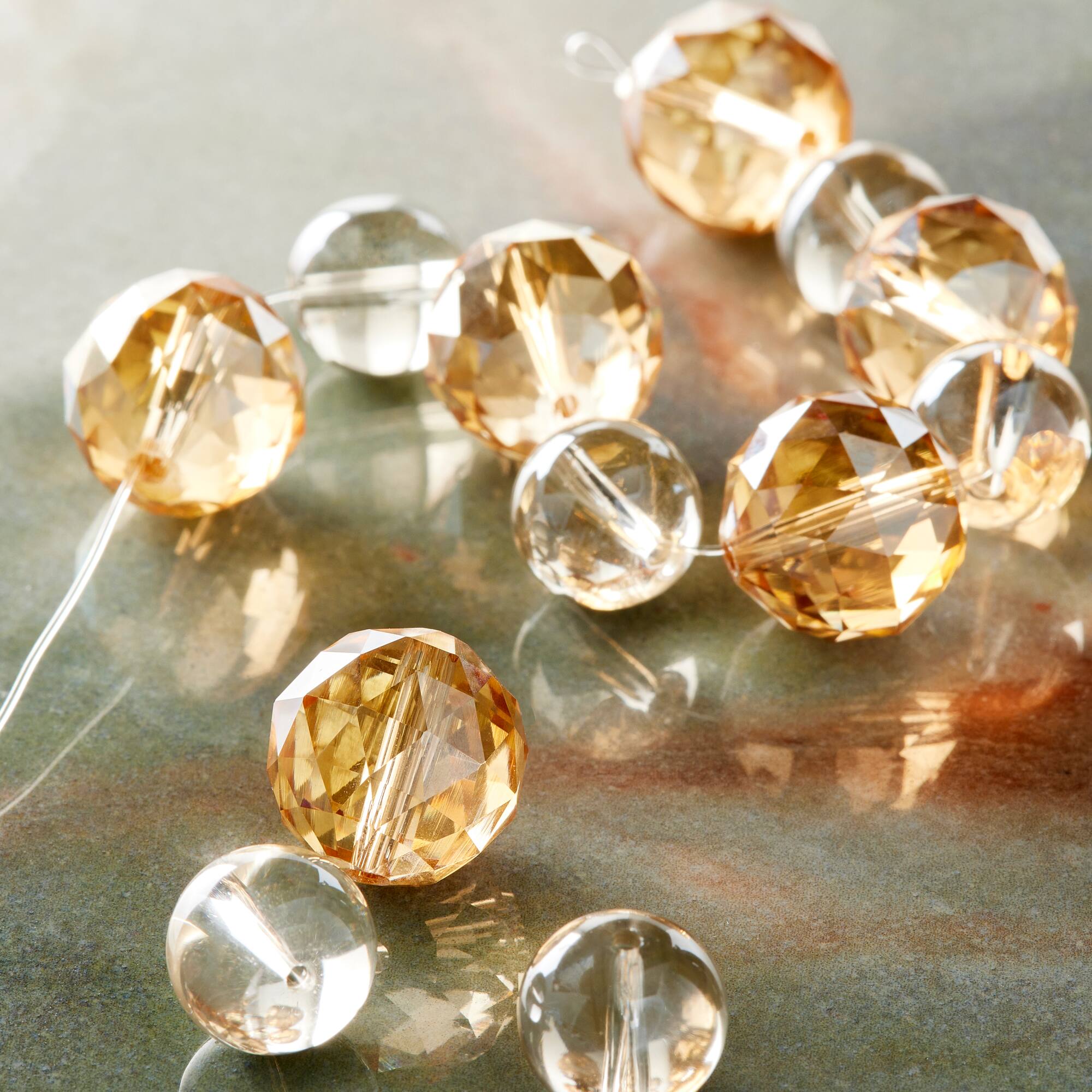 12 Pack: Amber Mix Large Glass Faceted Round Beads by Bead Landing™